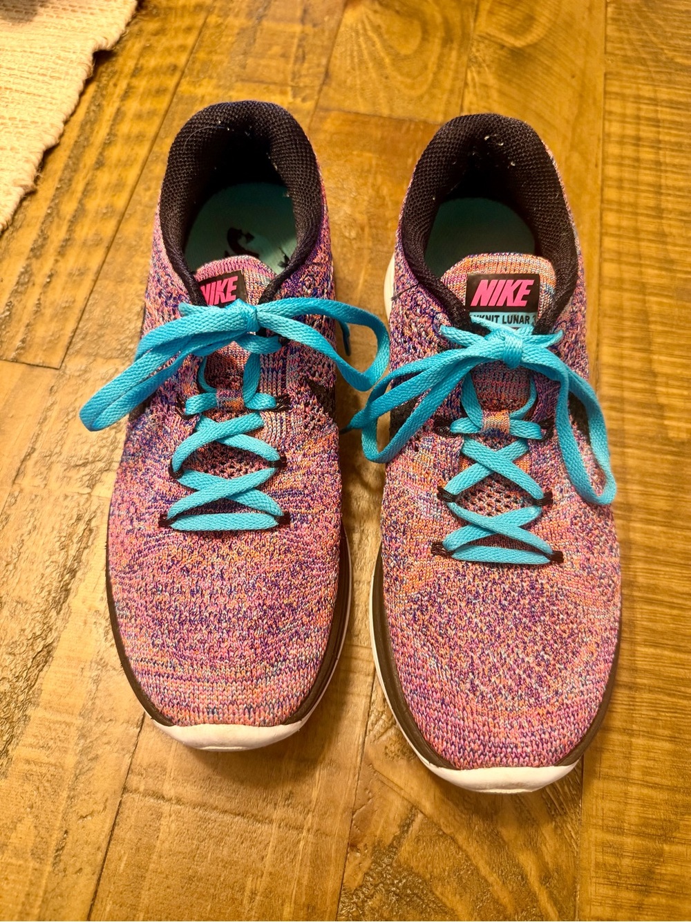 Nike Women’s Pink/Purple Knit Running Shoes with Turquoise Laces
